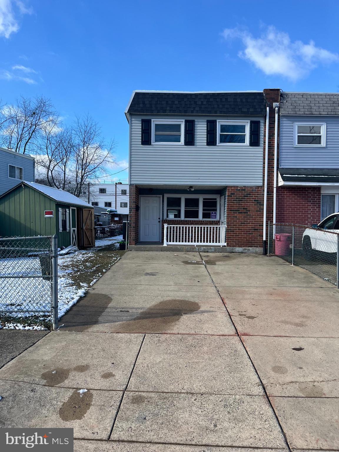 a front view of a house with a garage