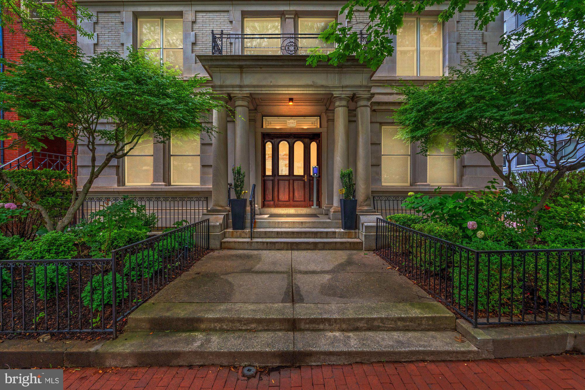 a front view of a house with a porch