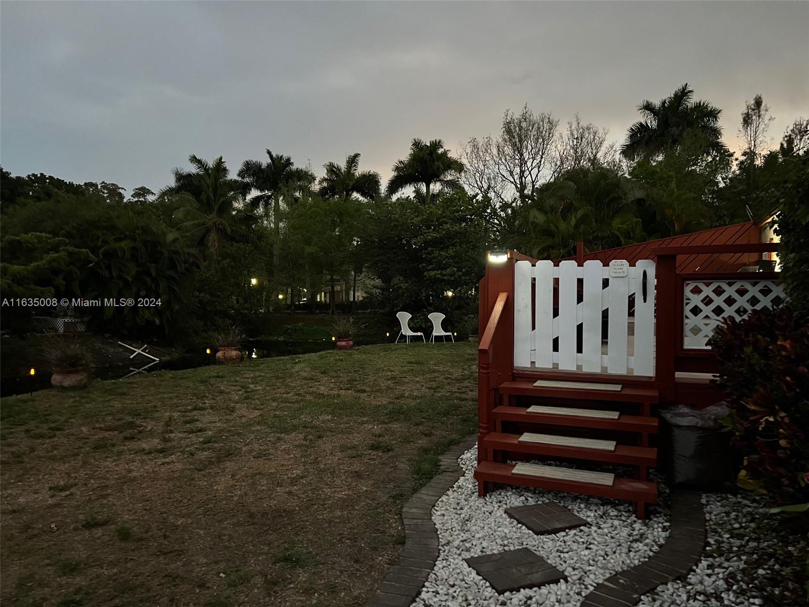 a view of a bench in a yard