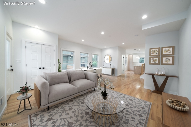 a living room with furniture and a table