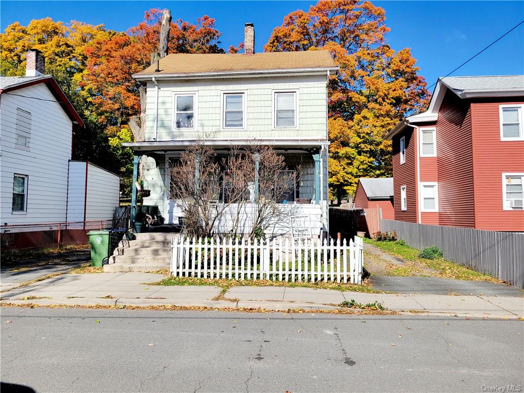 Front facade featuring covered porch