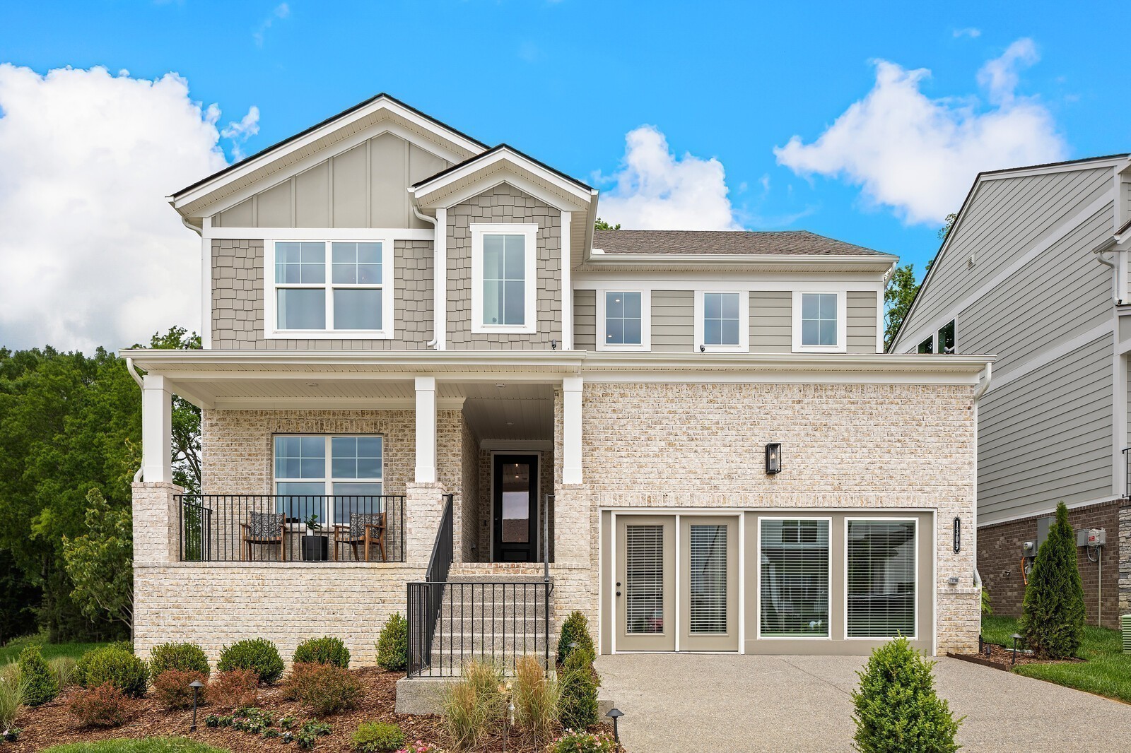 front view of a house with a yard