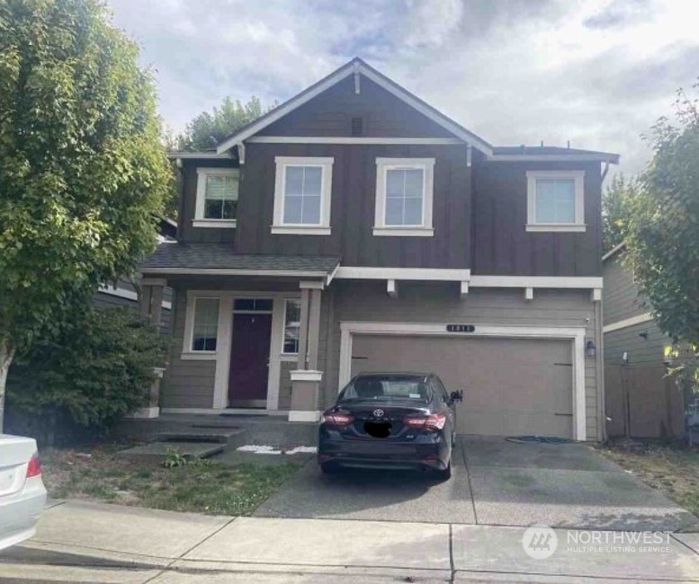 a car parked in front of a house