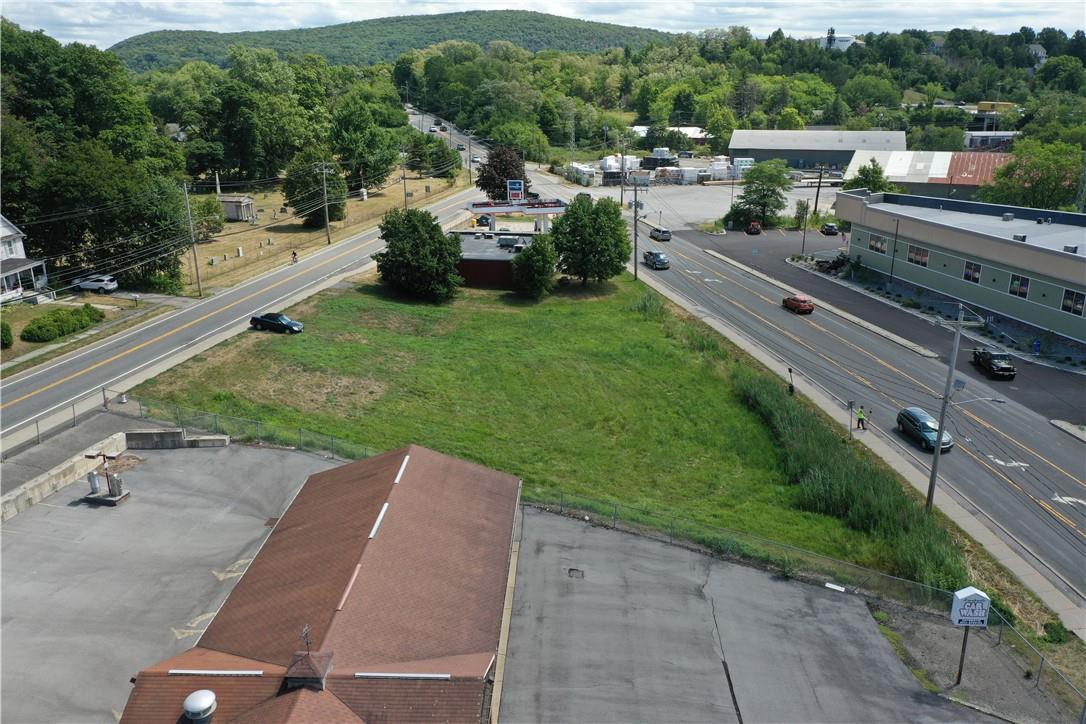 an aerial view of a yard with table and chairs