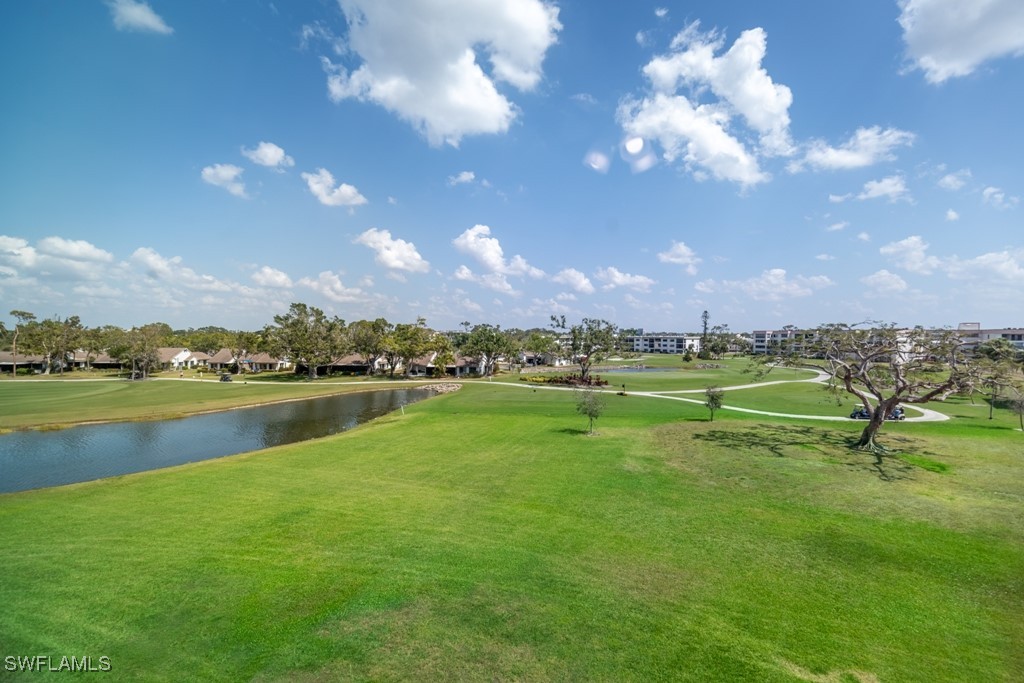 a view of a golf course with a lake