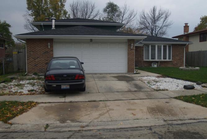 a car parked in front of a house