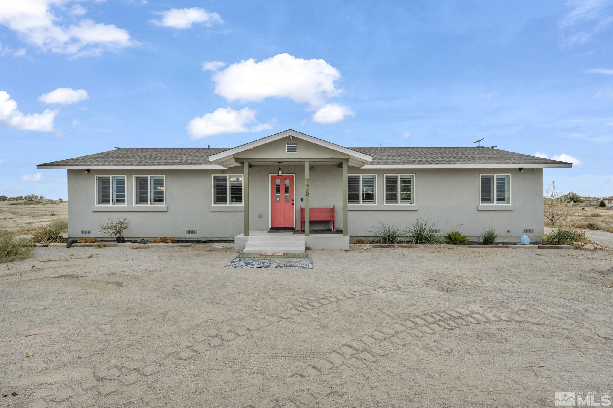 a view of a house with a patio