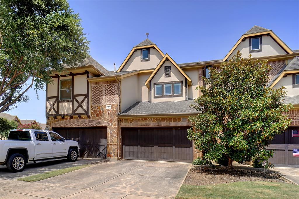 a front view of a house with parking