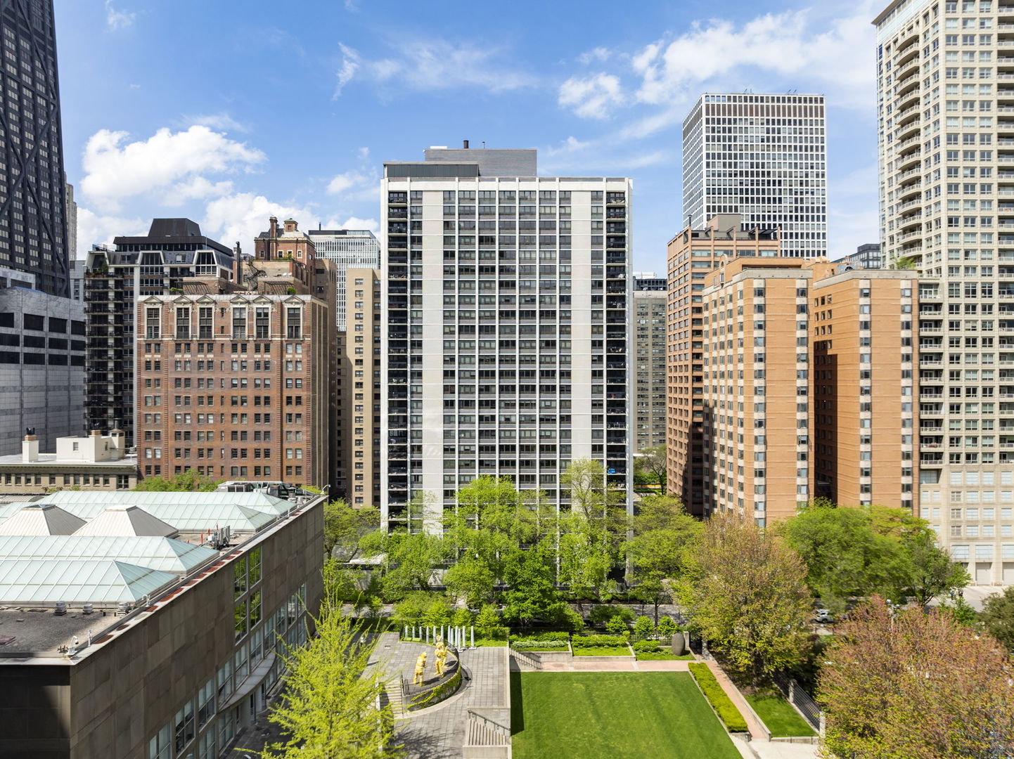 a view of a city with tall buildings