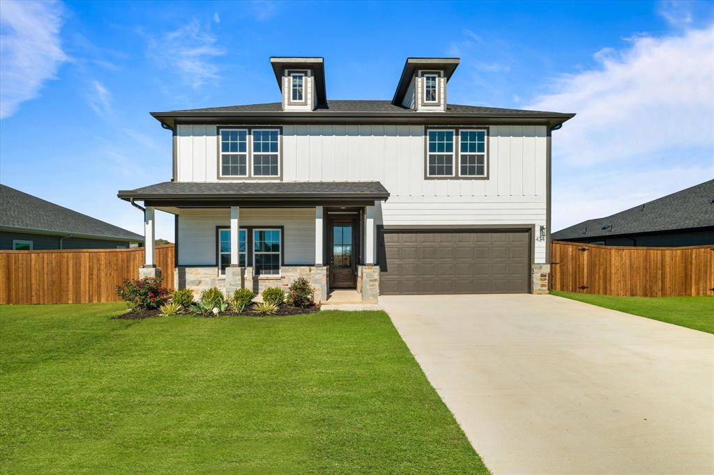 a front view of house with yard