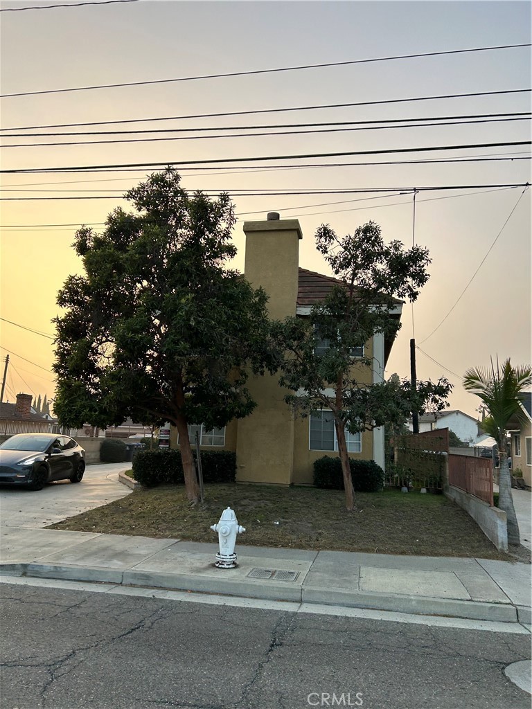 a view of a house with a street