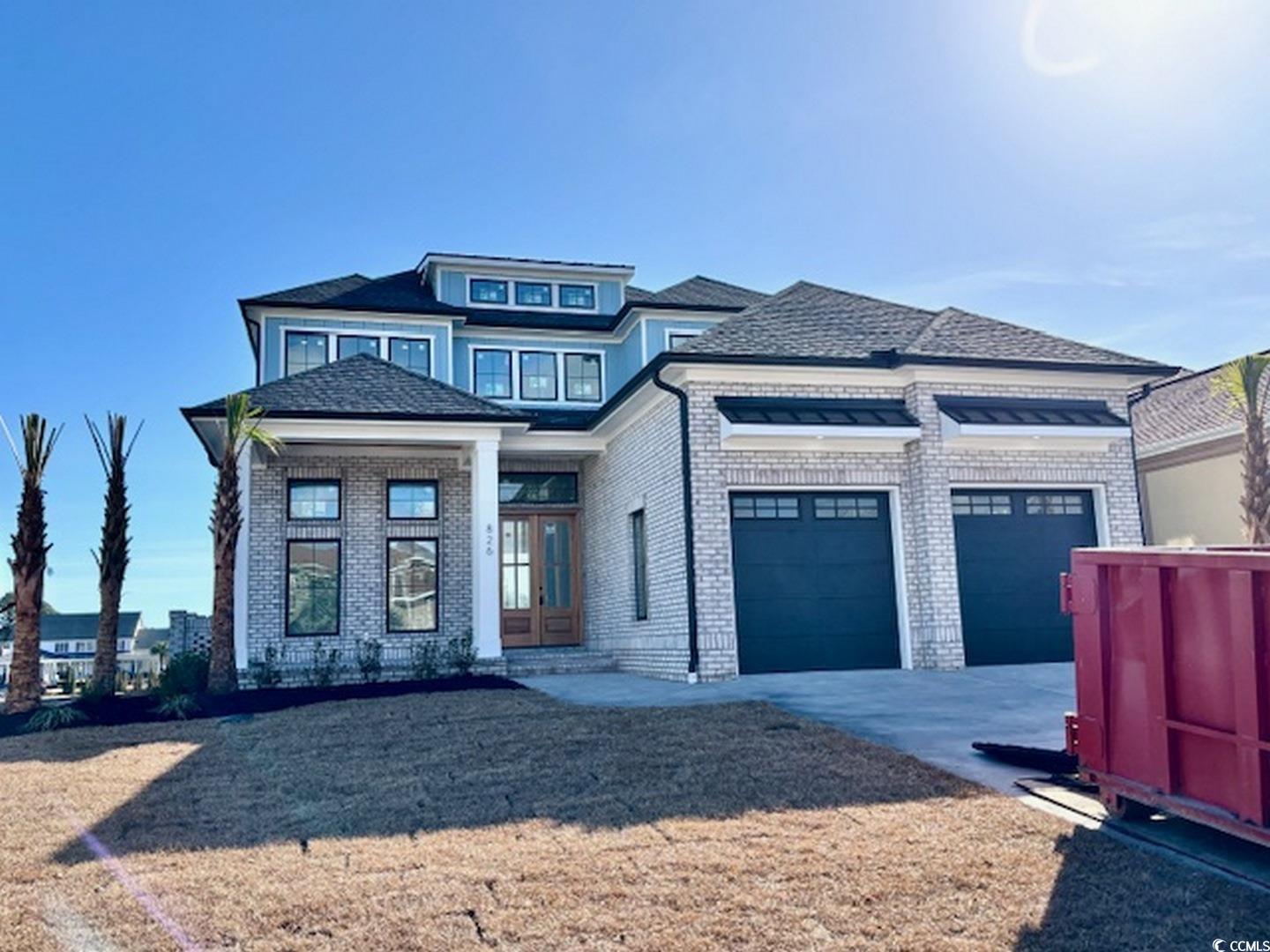 Prairie-style house with a garage