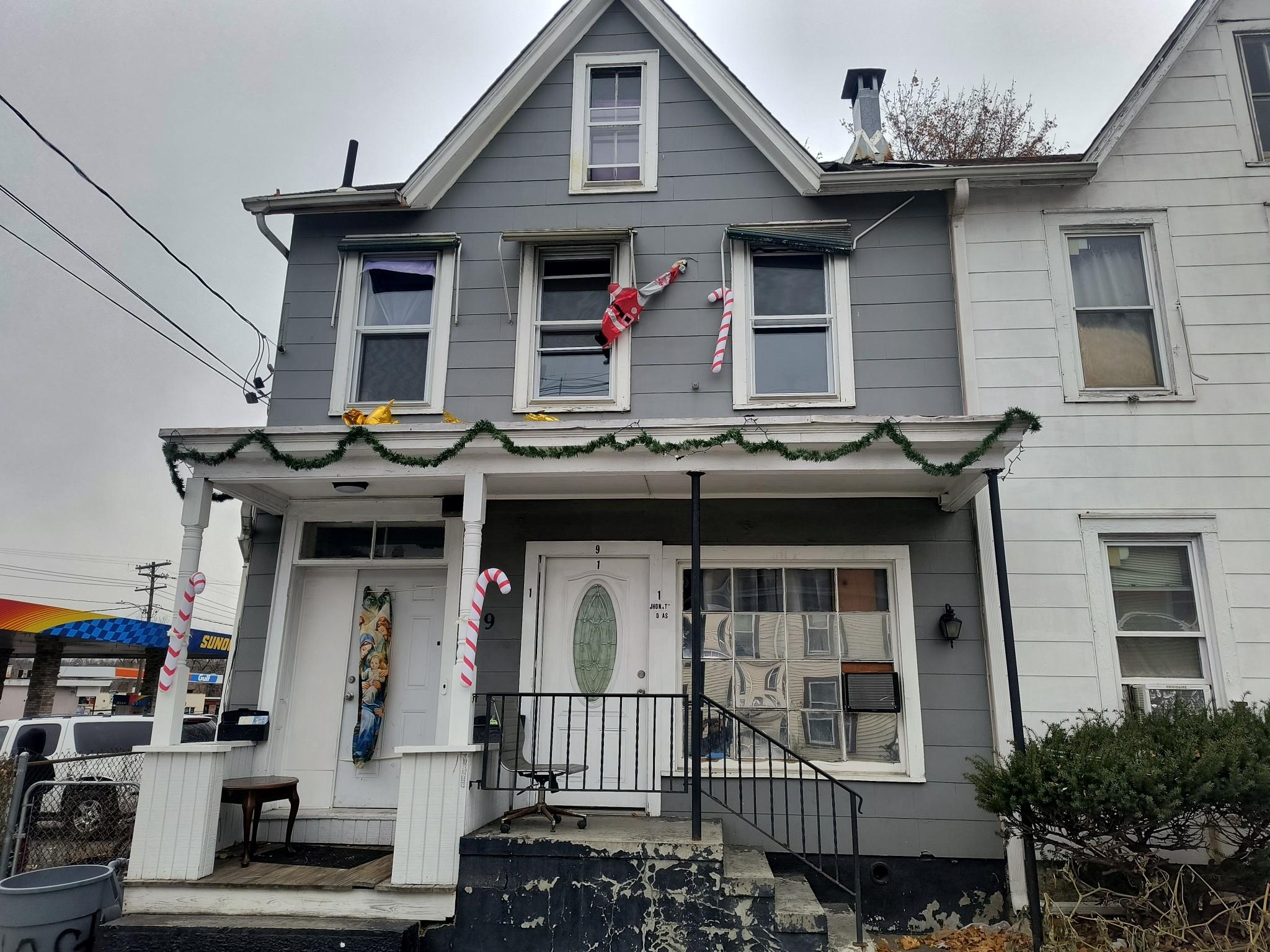 a front view of a house with balcony