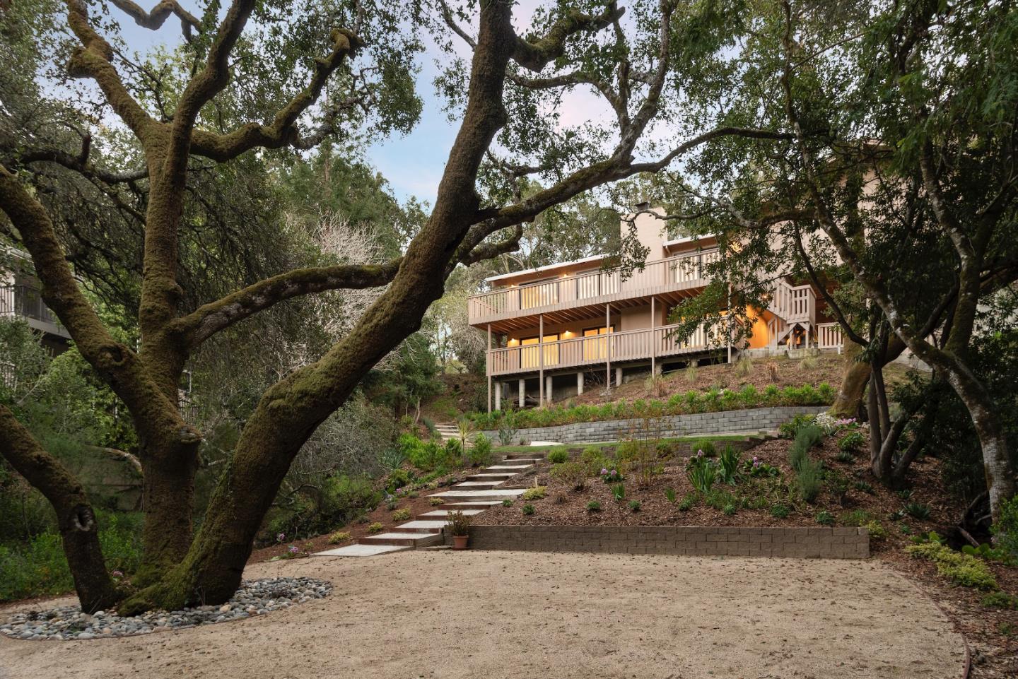 an outdoor view of house with trees