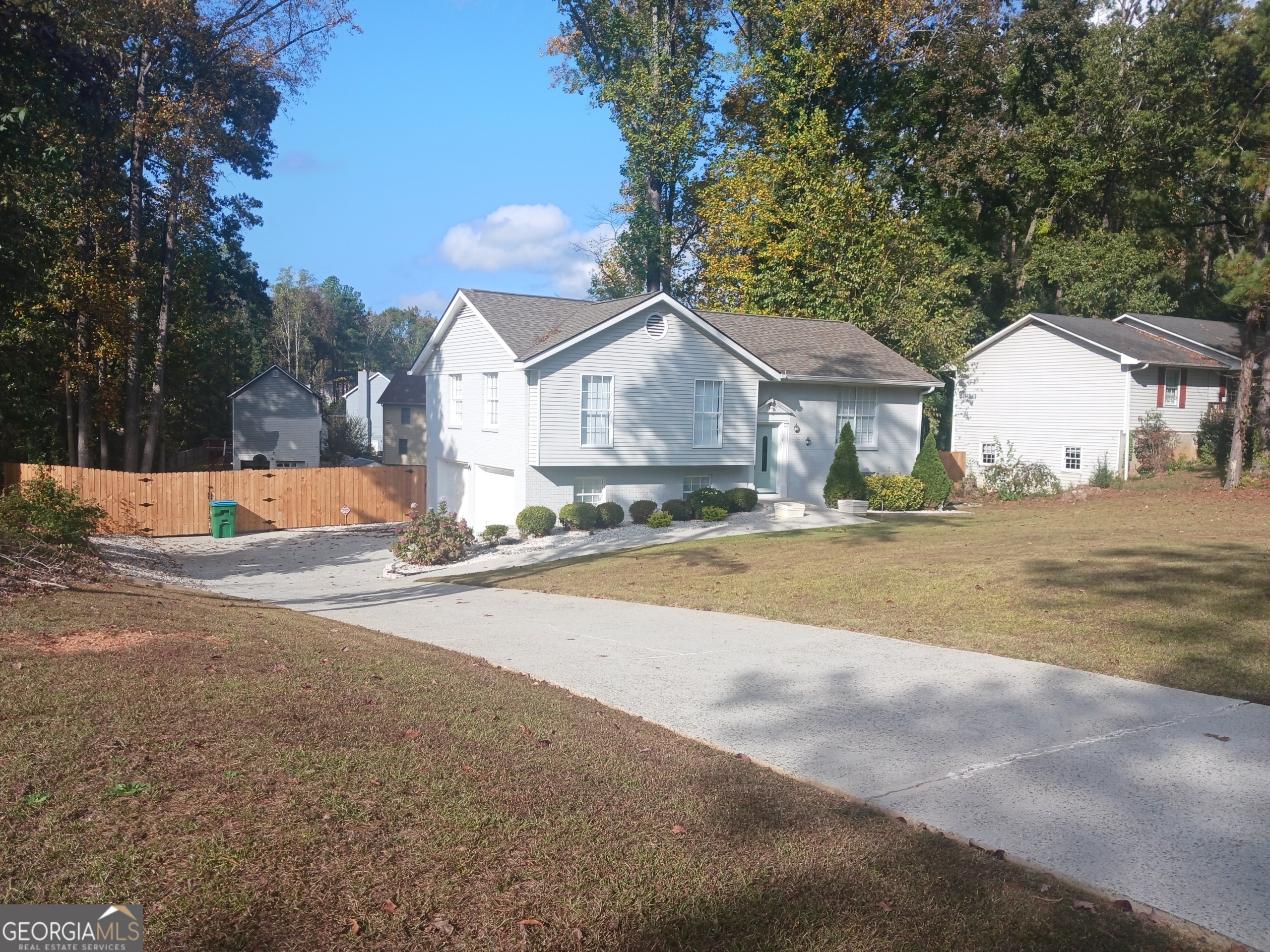 a view of large house with a yard