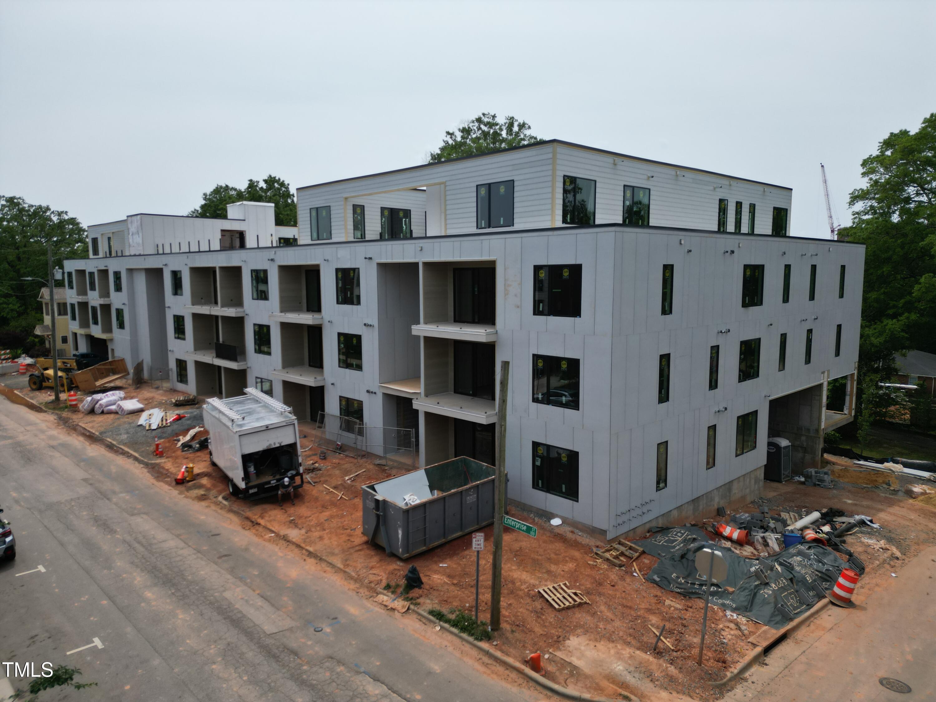 a front view of building with parking space