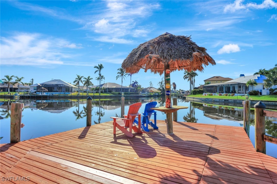 a view of a lake and outdoor seating