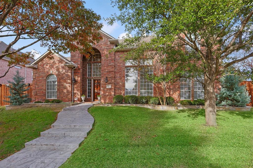 front view of a building with a big yard