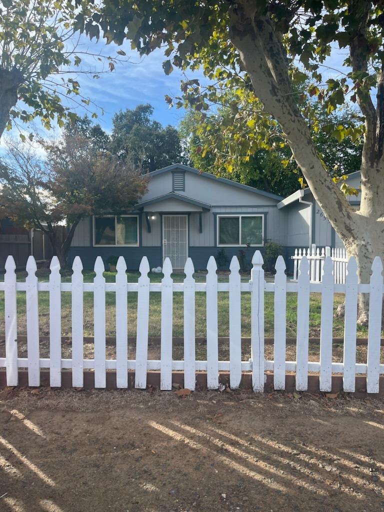 a view of a house with a garden