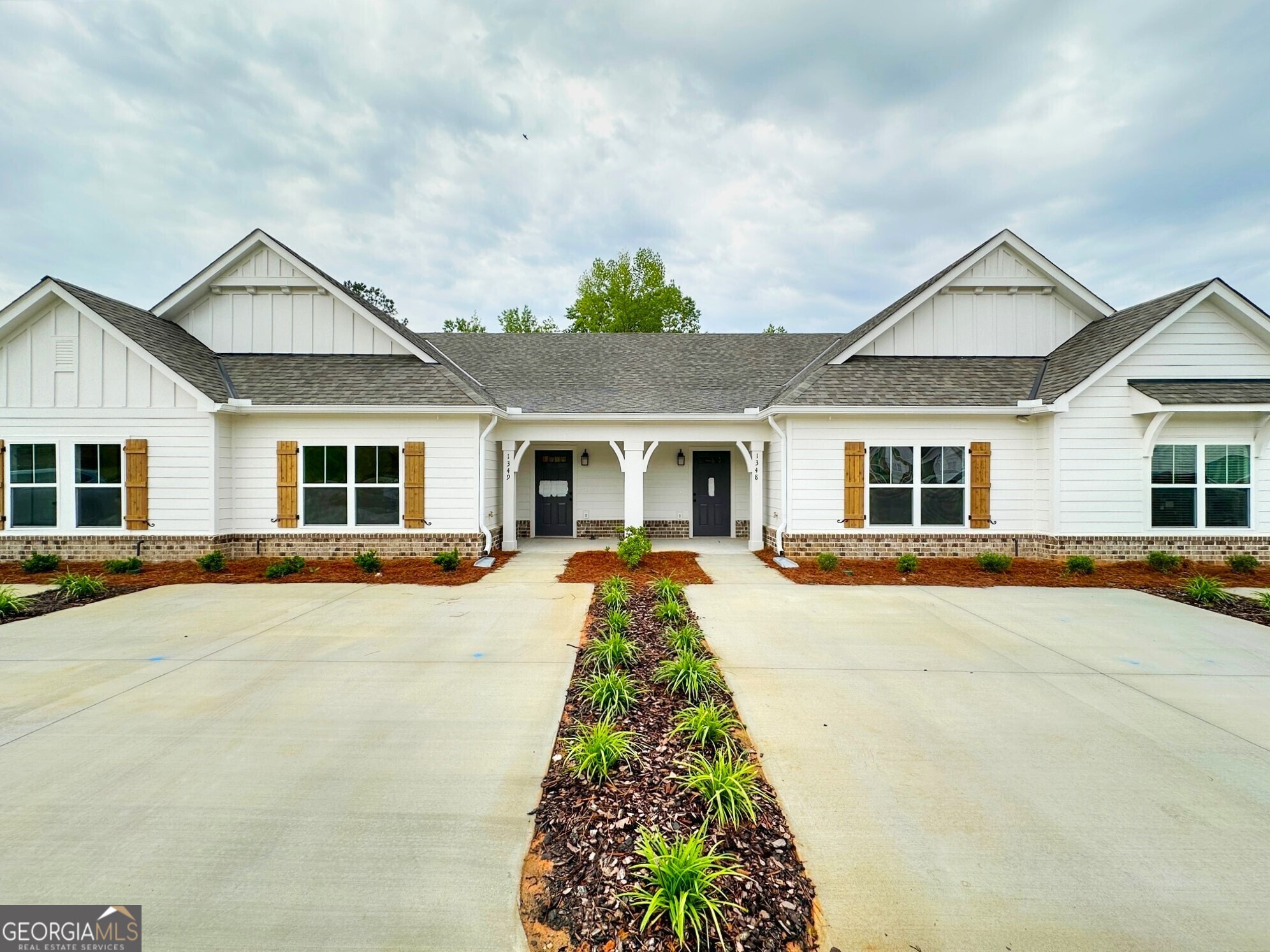 front view of a house with a patio