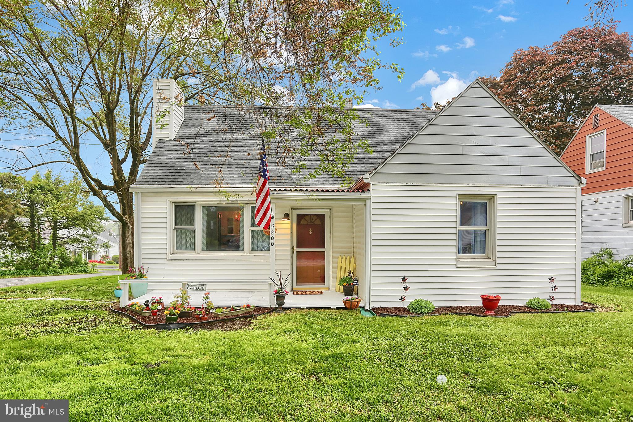 a front view of house with yard