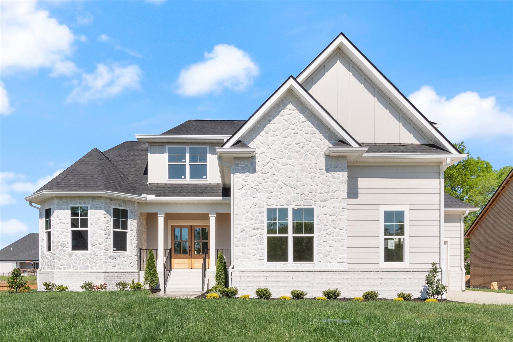 a view of a house with a yard