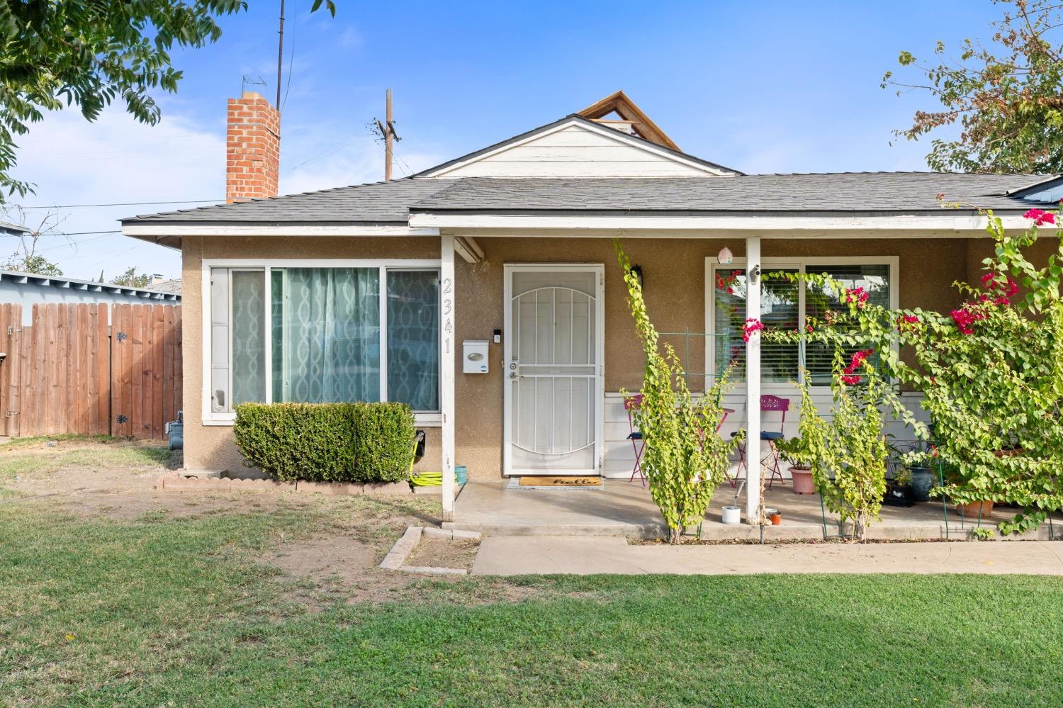 a front view of a house with a porch