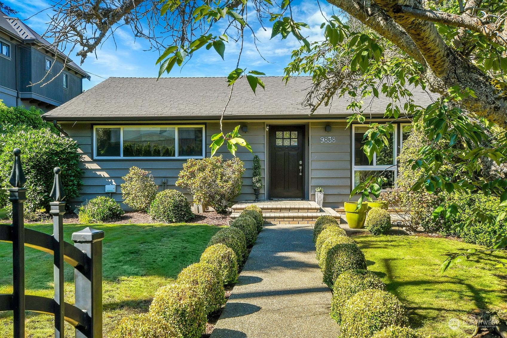 a front view of a house with a yard