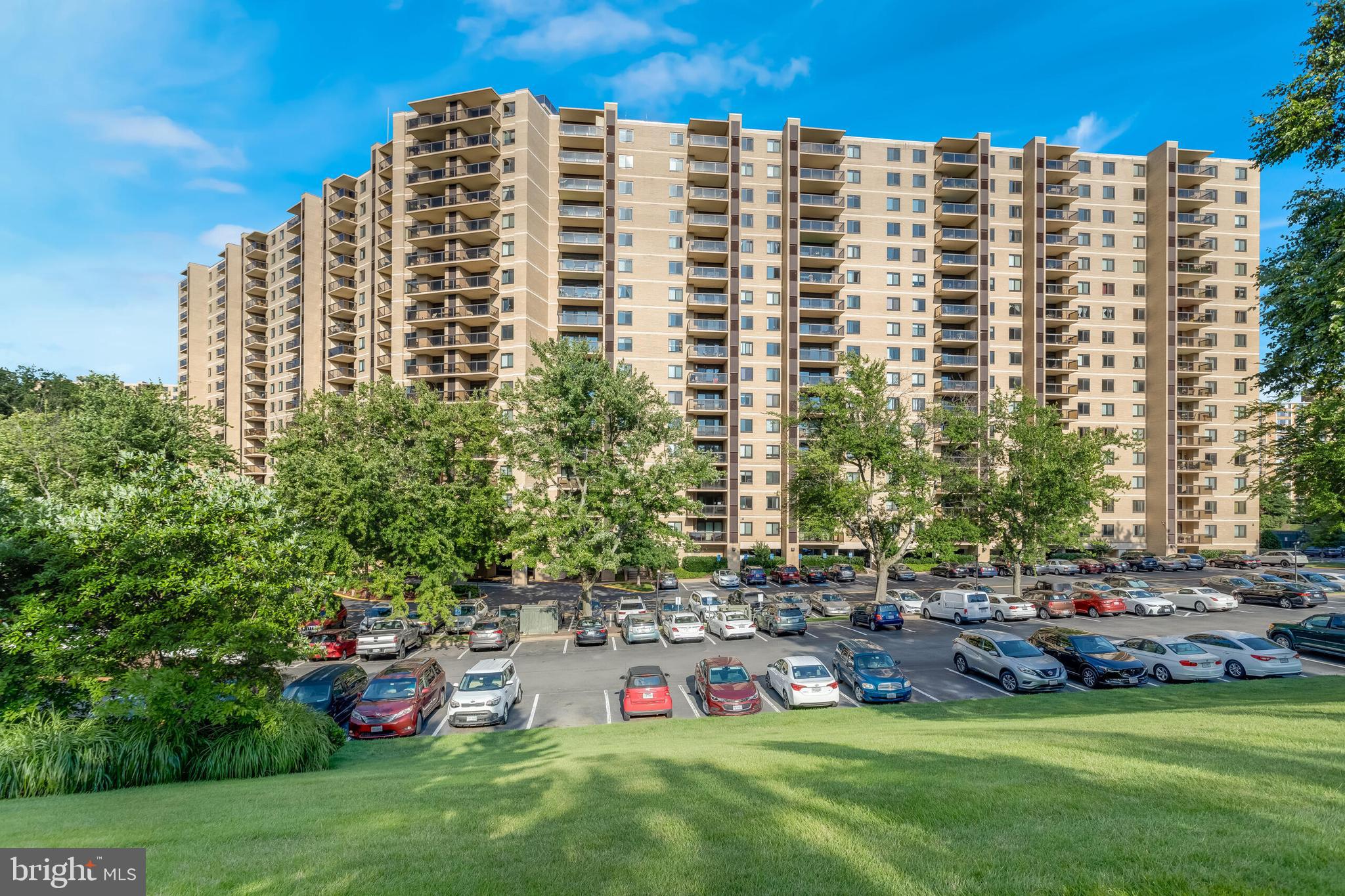 a view of a large building with a yard