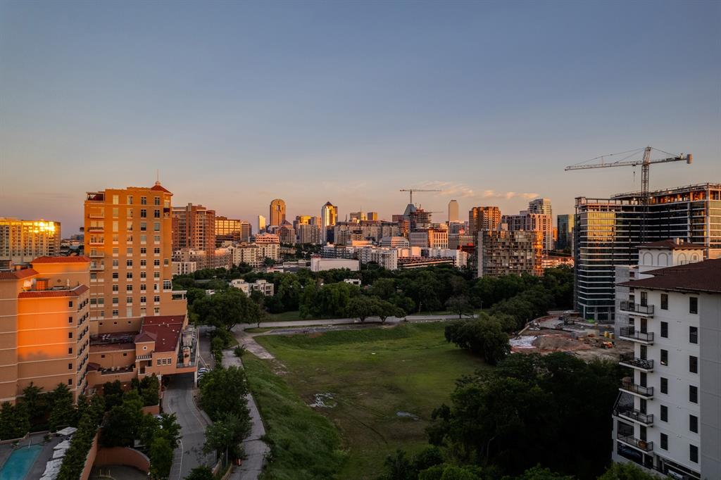 a view of a city with tall buildings