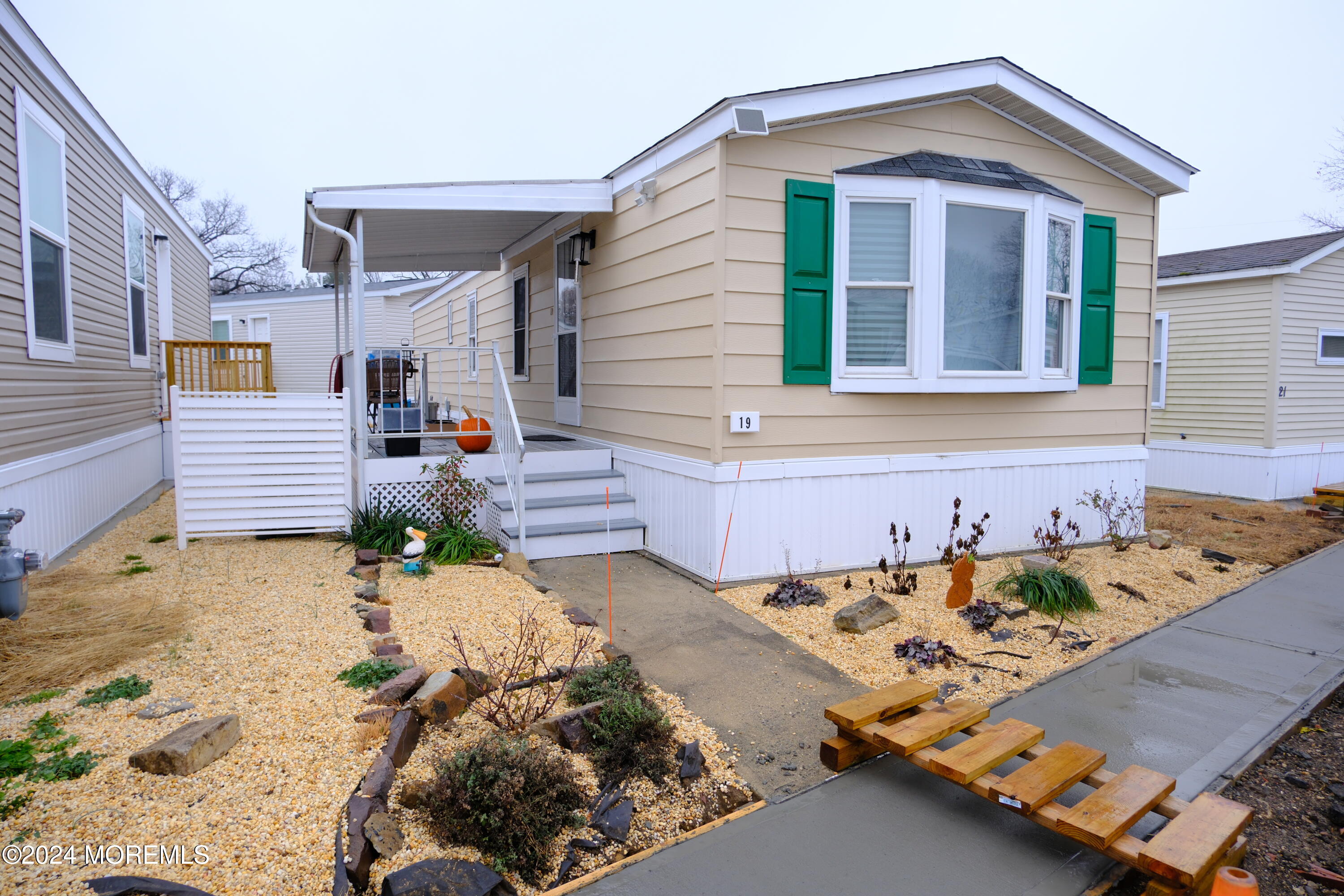 front view of a house with a yard