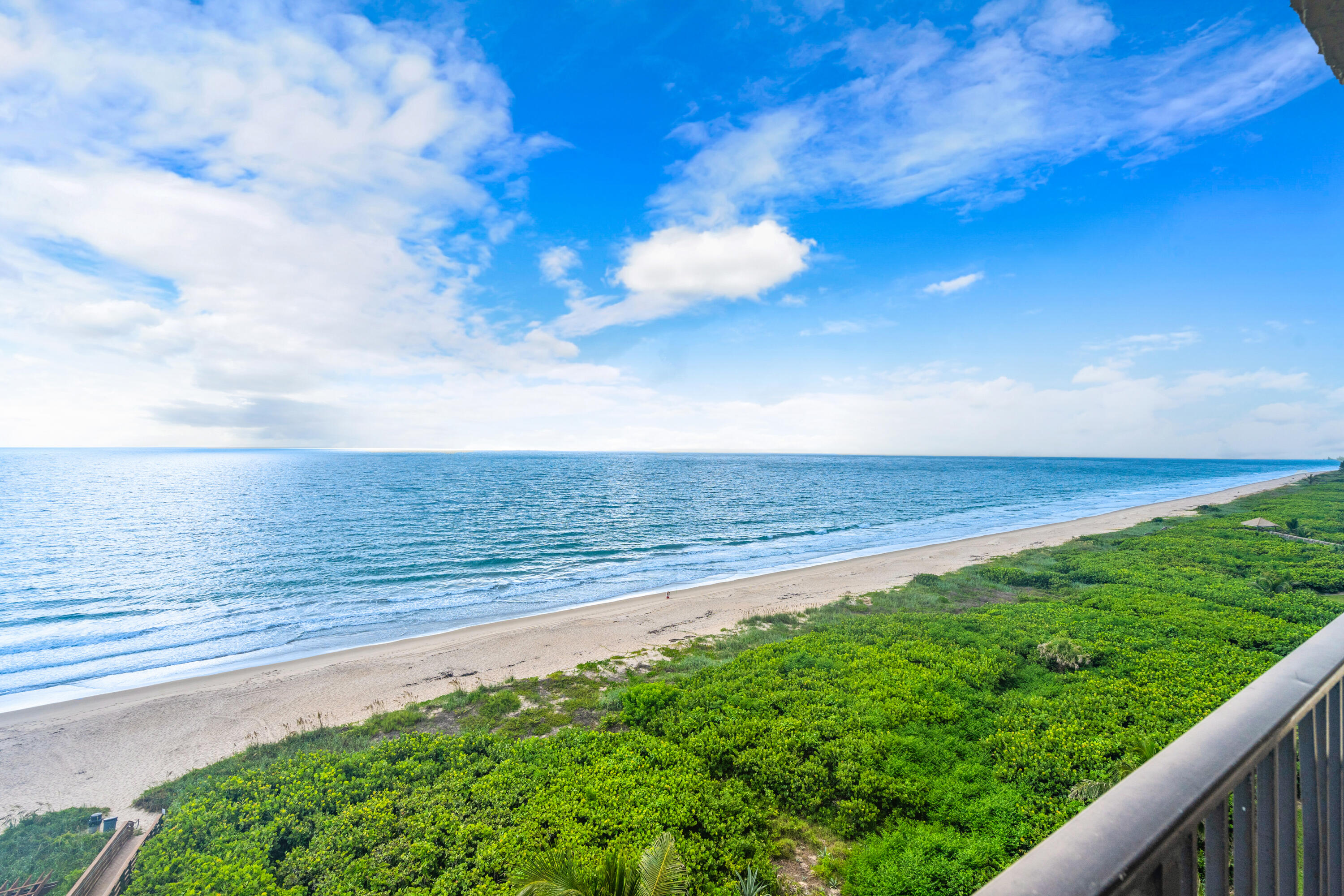 a view of an ocean from a balcony