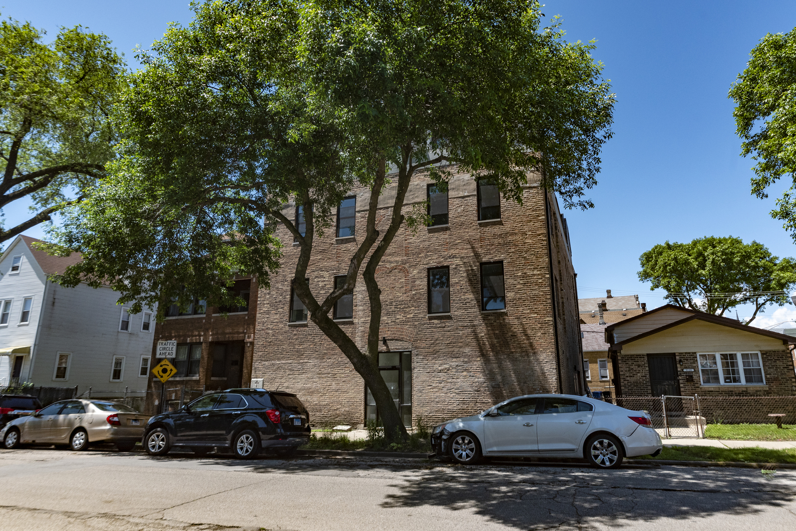 a car parked in front of a house