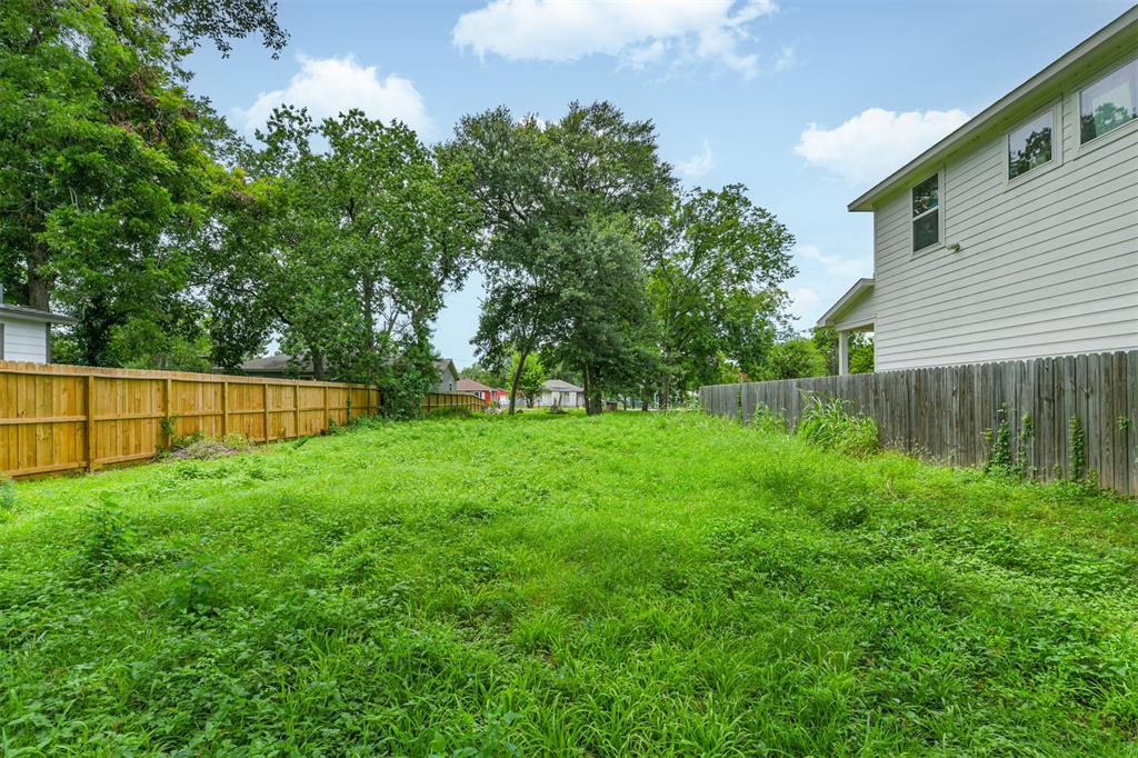 a view of a backyard with a garden