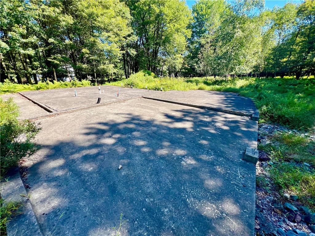 a view of a road with a yard