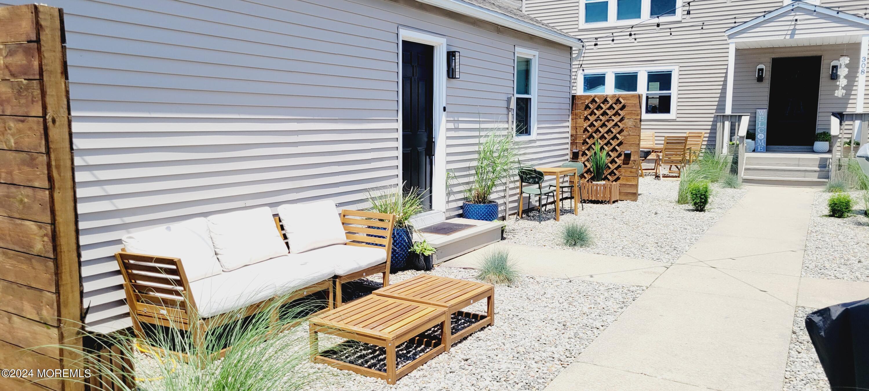 a view of table and chairs in patio