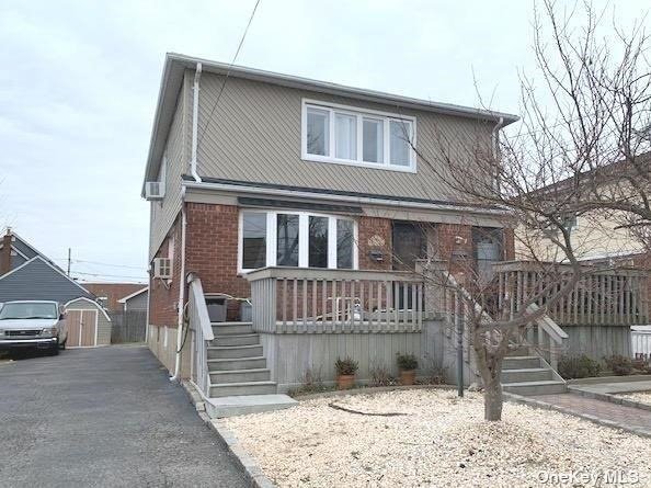 a view of a house with a fence