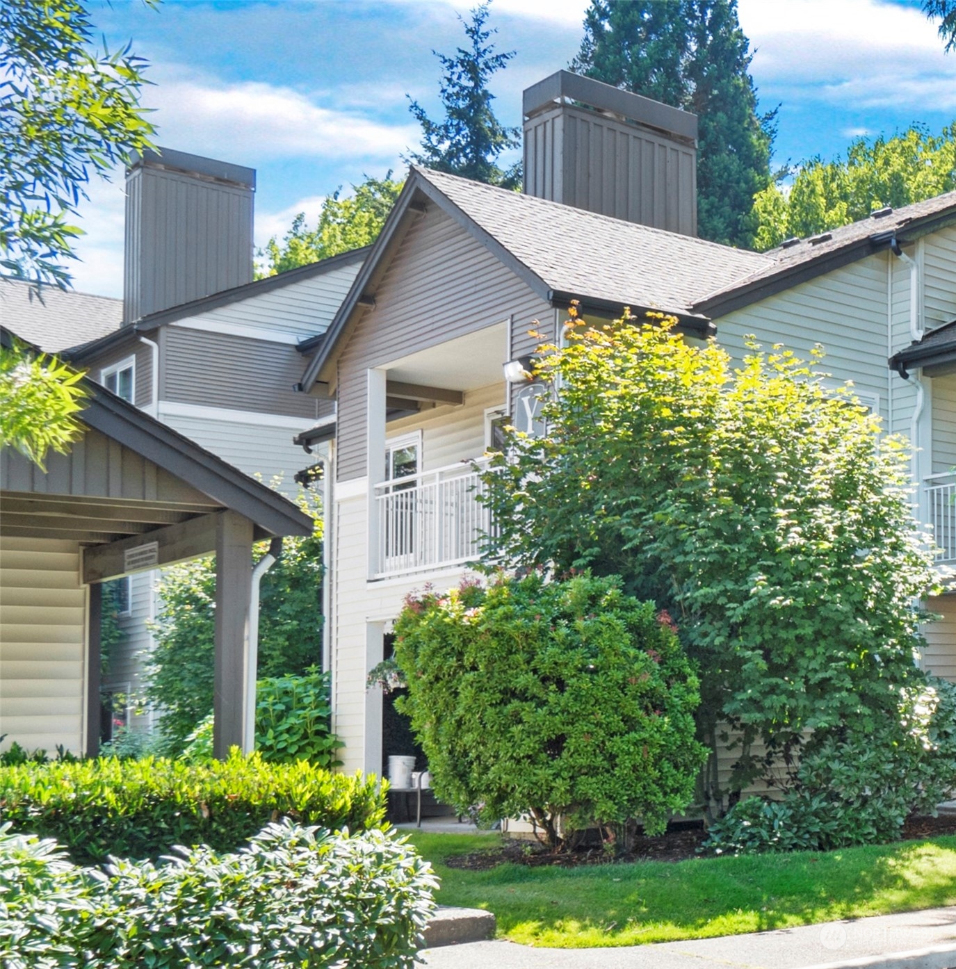 front view of a house with a yard