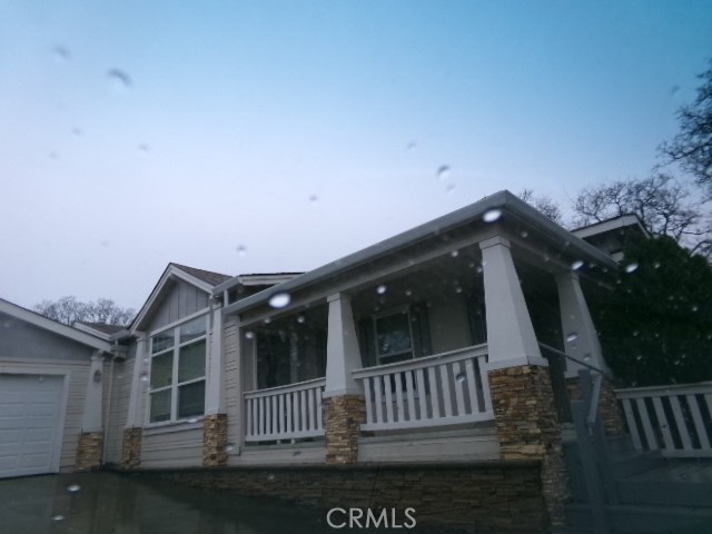 a view of back yard of a house