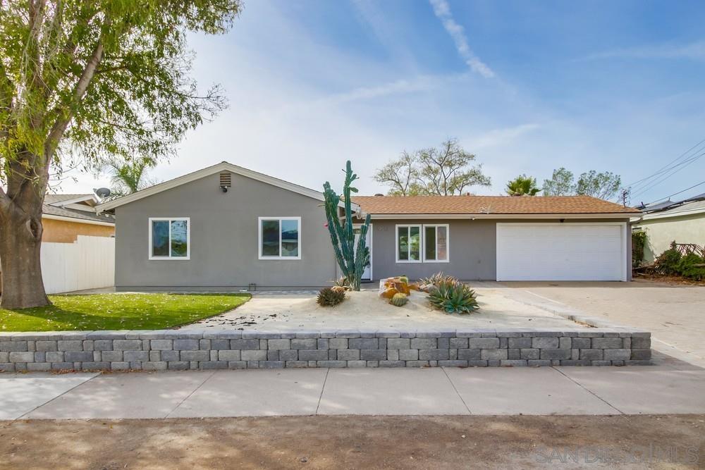 a view of house with outdoor space and sitting space