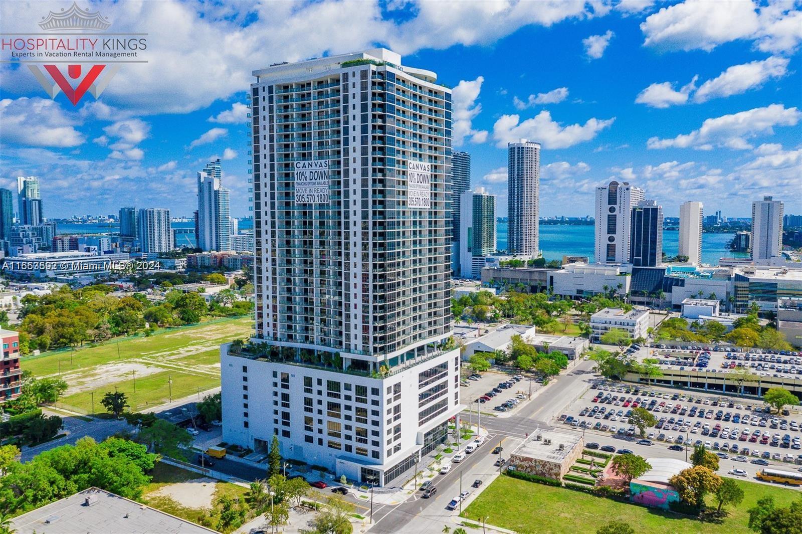 a view of a city with tall buildings