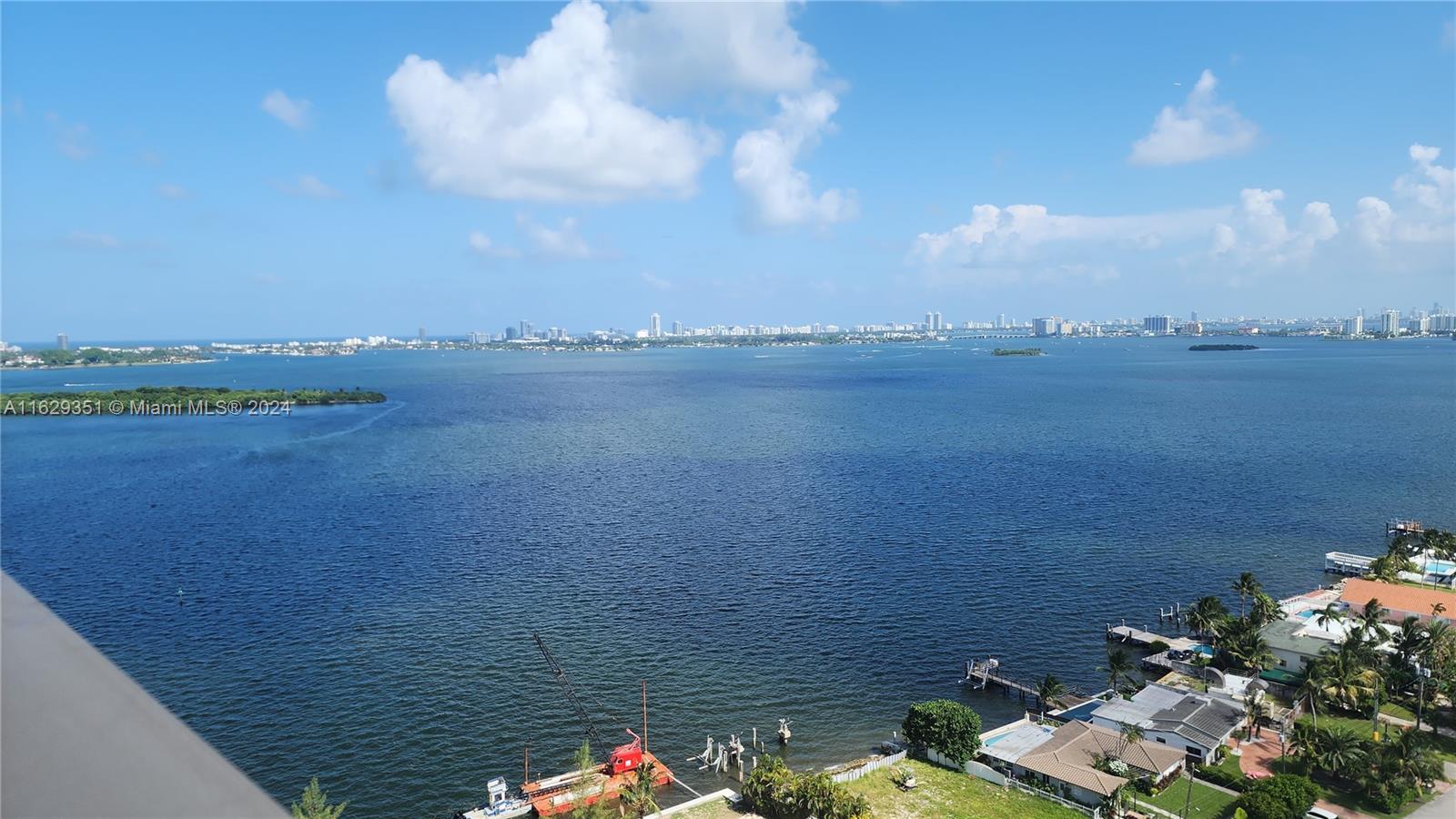 a view of a lake from a balcony