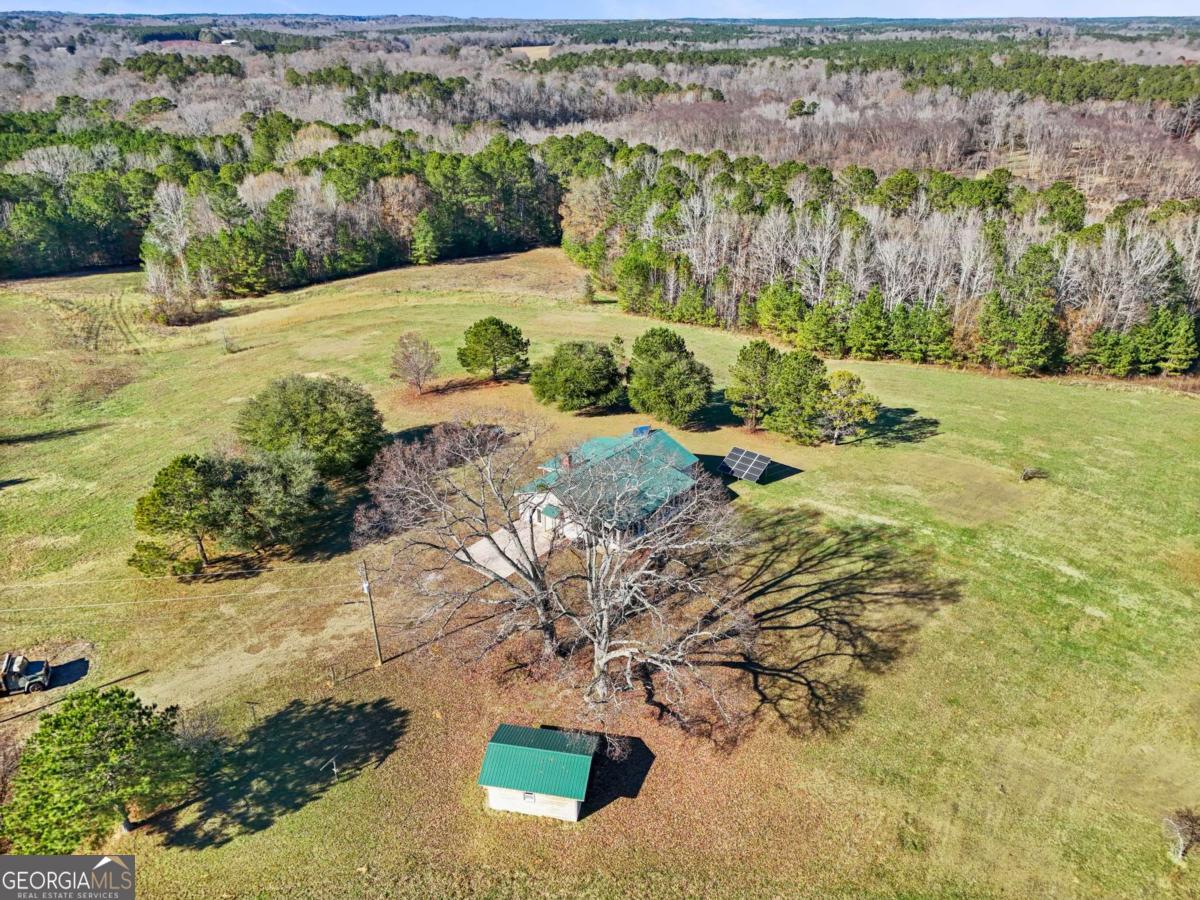 a view of a yard with an trees