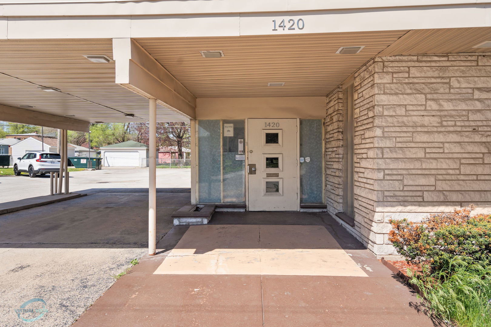 a view of a entryway door front of house