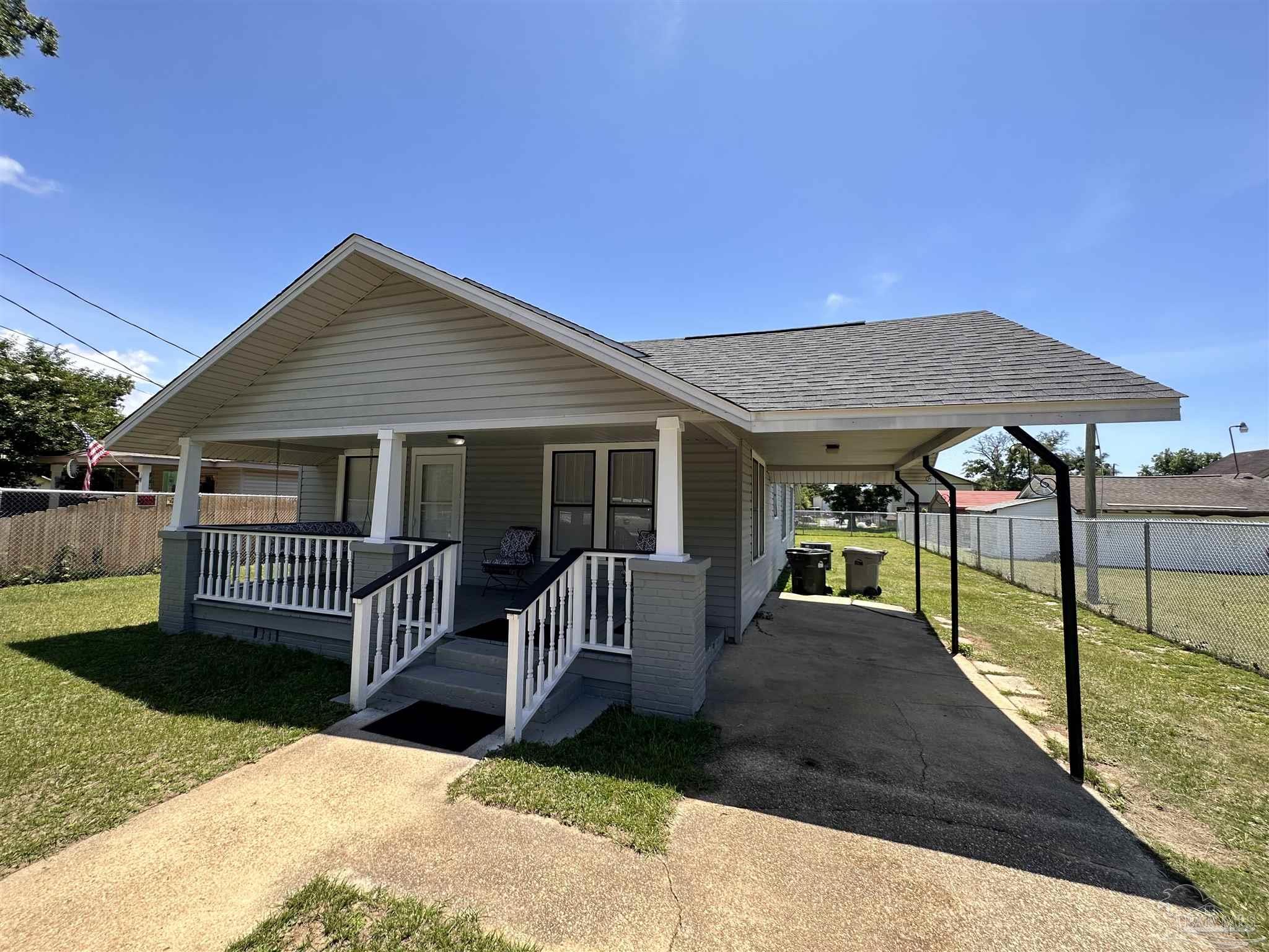 a view of a house with a patio