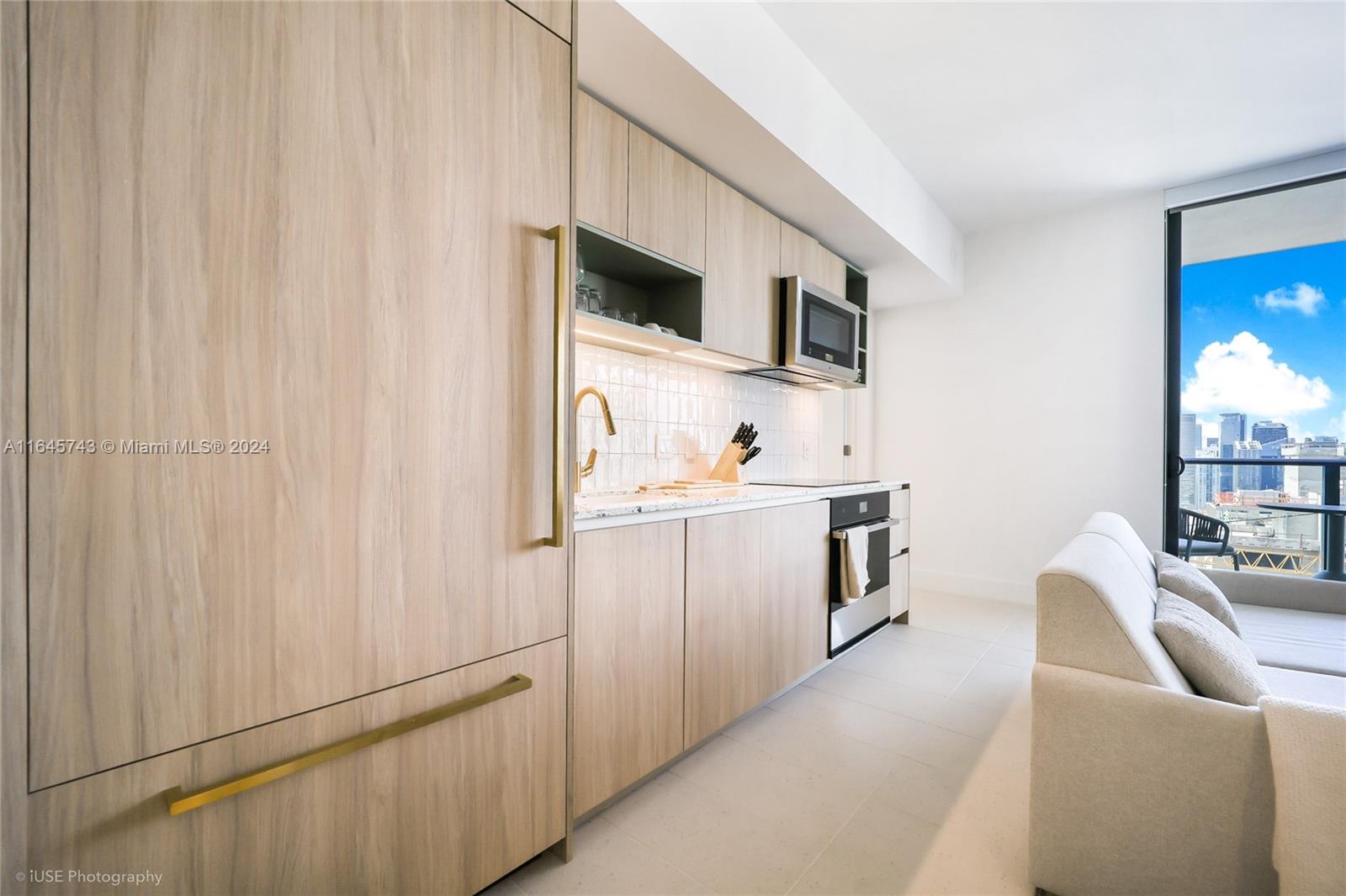 a hallway with cabinets