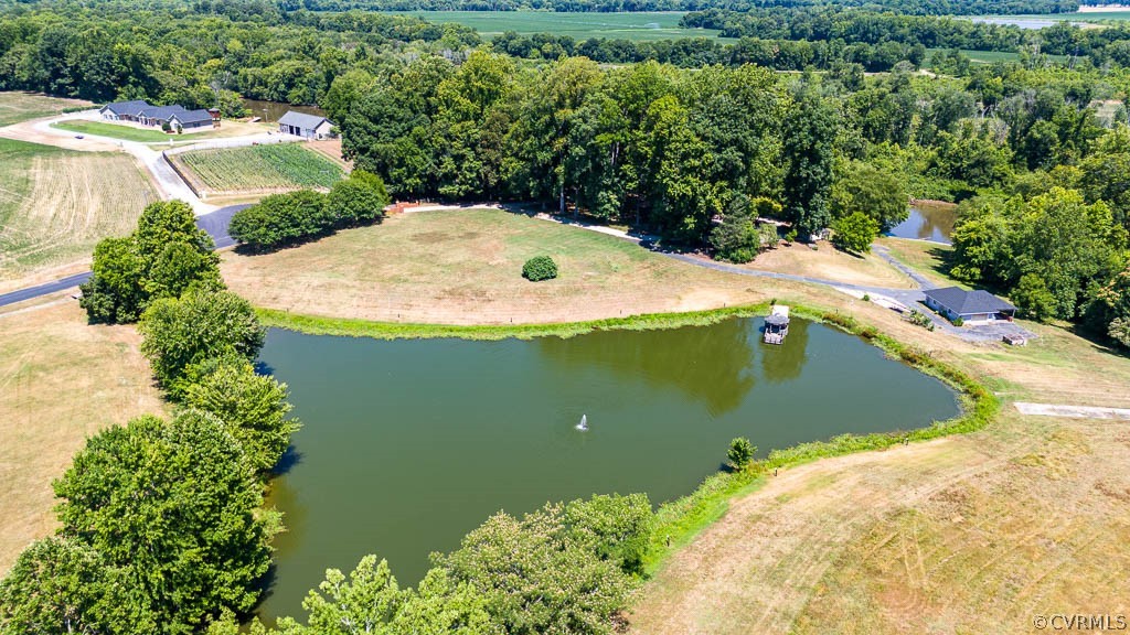 a view of a house with a yard and swimming pool