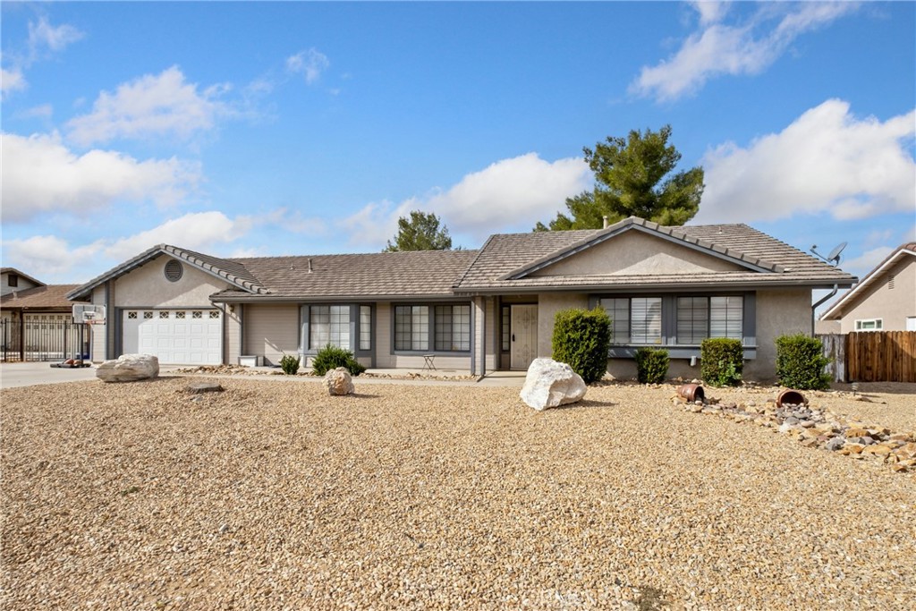 a front view of a house with a patio