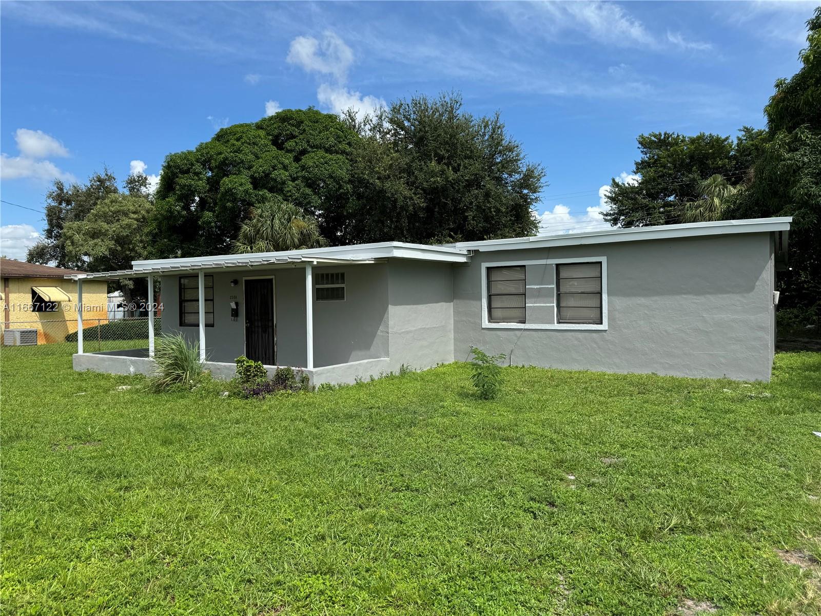 front view of house with a yard