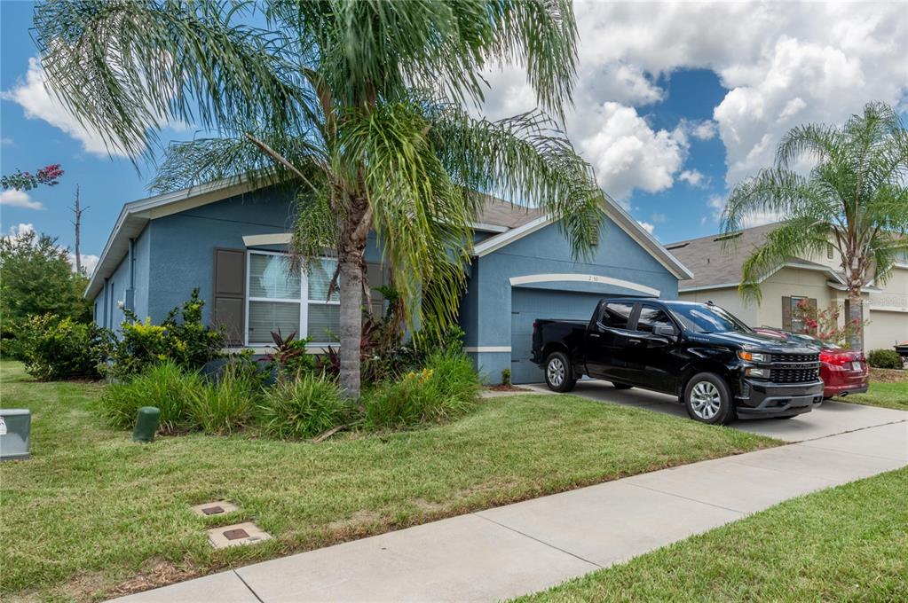 a view of a car in front of house